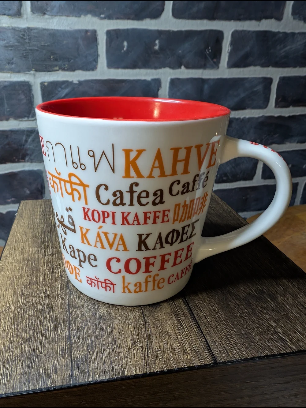 White and Red Coffee Mug with Multilingual 'Coffee' Design